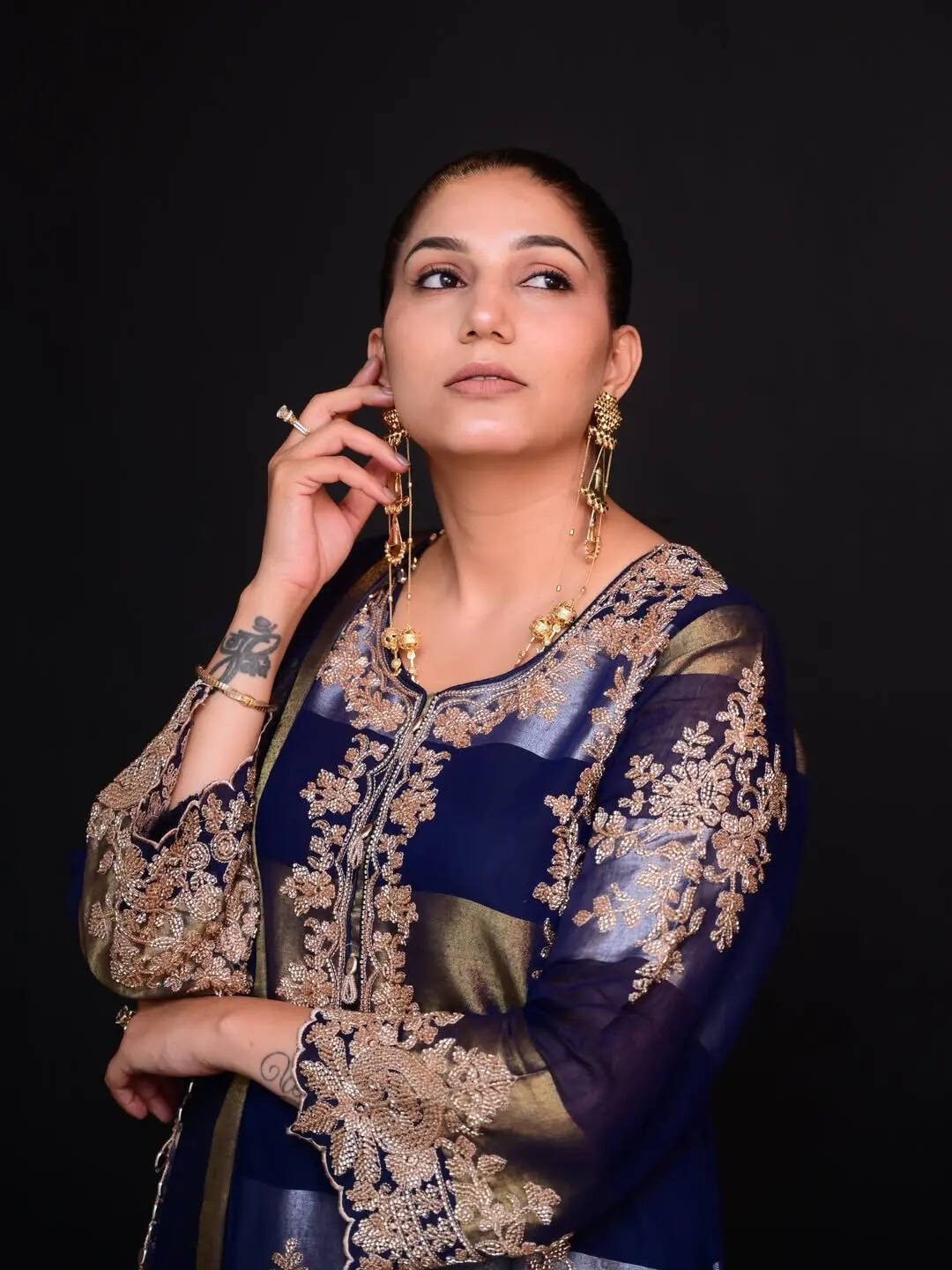 फोटोज में सपना चौधरी का लुक