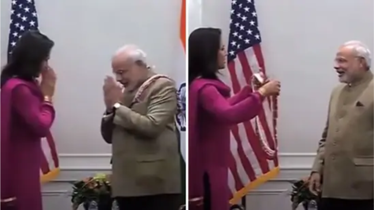 पीएम मोदी को नमस्ते करतीं तुलसी गबार्ड।