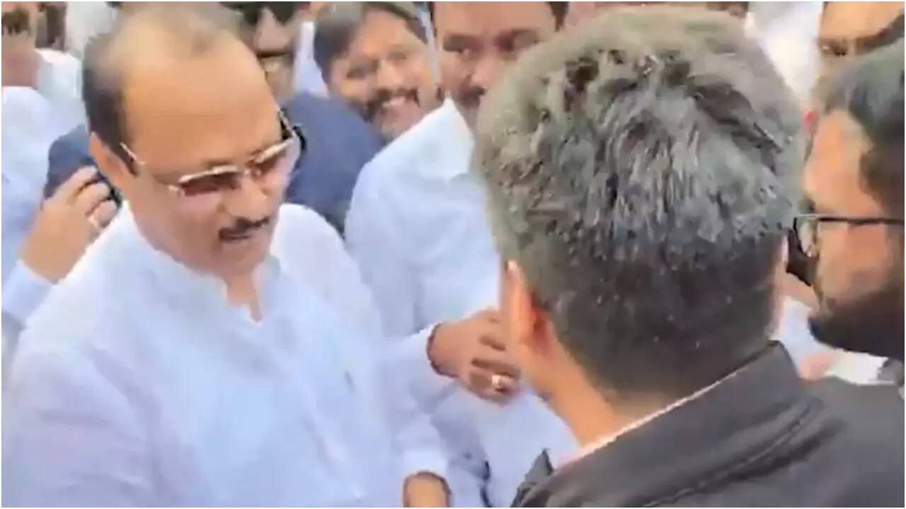 Rohit Pawar touched Ajit Pawar feet