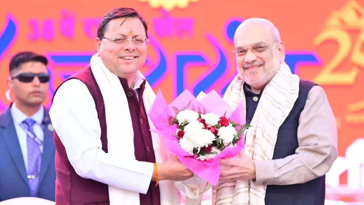Pushkar Singh Dhami and Amit Shah