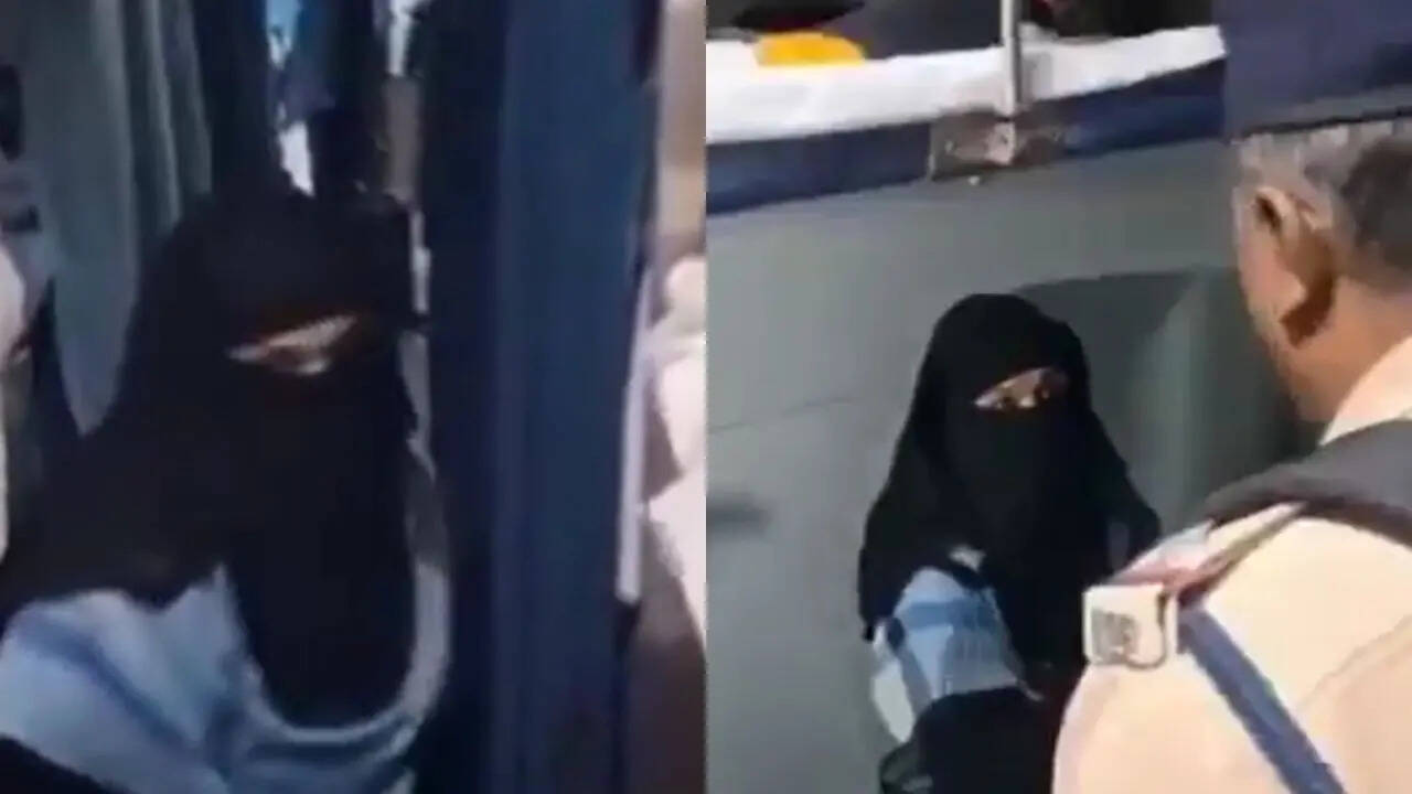 Burqa-Clad Woman Refuses To Show Ticket