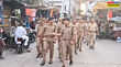 Sambhal News बकरीद से पहले संभल में पुलिस का फ्लैग मार्च संवेदनशील इलाकों को लेकर प्रशासन अलर्ट