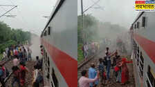 Bijnor ट्रेन के पहियों से निकला धुआं हड़बड़ी में डिब्बों से कूदे लोग