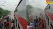 Bijnor ट्रेन के पहियों से निकला धुआं हड़बड़ी में डिब्बों से कूदे लोग