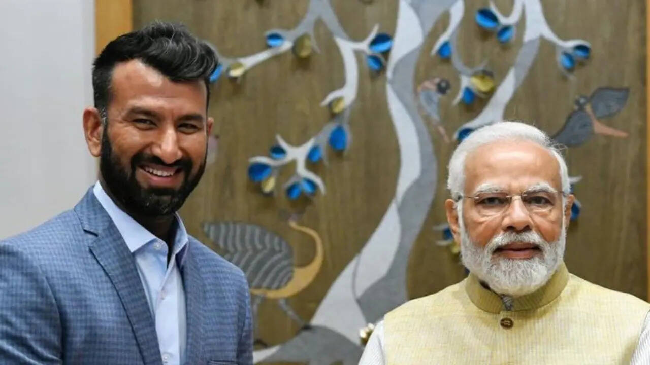 Cheteshwar Pujara and Narendra Modi