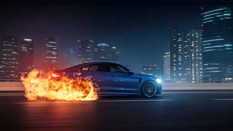 Car Catches Fire on Road in Etah (AI Image)