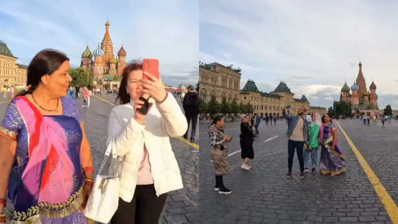 महिला संग सेल्फी लेते रूस के लोग (Instagram/@samboyvlogs)