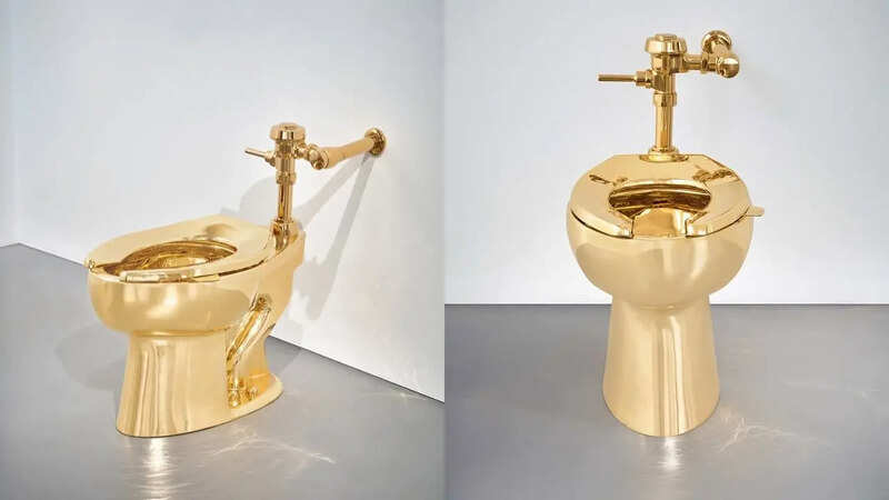 Gold Toilet Auction Maurizio Cattelans 18K Gold Toilet America Sold for 12 Million Dollar