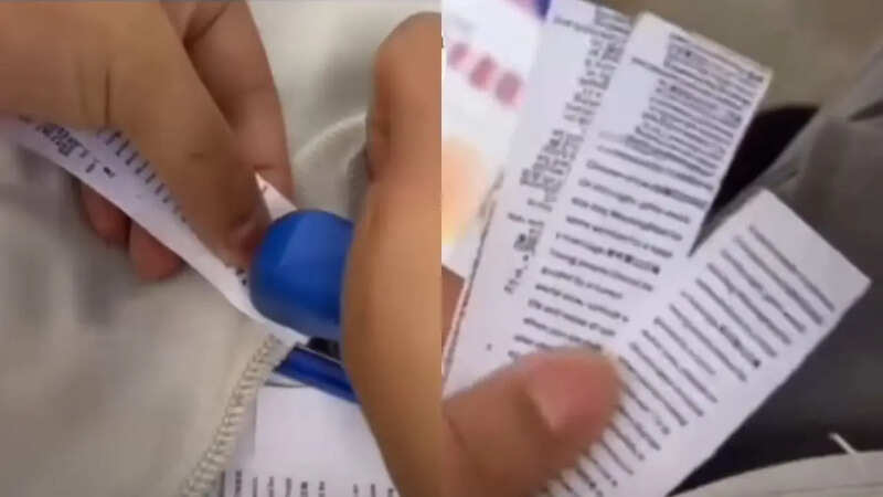 एग्जाम में चीटिंग करता स्टूडेंट