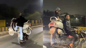 बाइक पर स्कूटी रखकर ले जाते दिखे लड़के, दोस्तों के साथ रात में हुड़दंगई का वीडियो हुआ वायरल