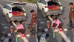 बीच राह सड़क पर ही गैस चूल्हा रखकर खाना बनाने लगा परिवार, Video देख आप भी पीट लेंगे अपना माथा