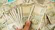 हर महीने कमाते हैं 50000 से 2 लाख रुपये जानें 10 साल में कितनी होगी बचत