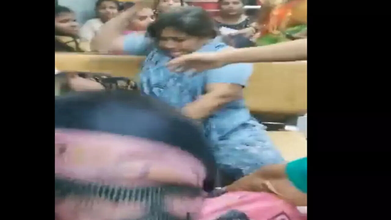 women commuters fight over seat in mumbai local train two including cop ...
